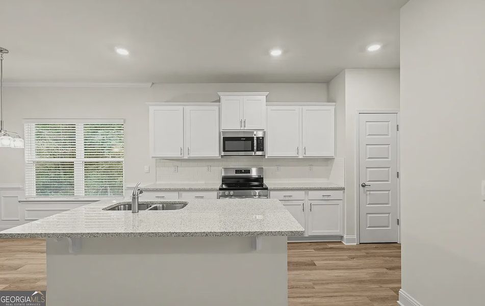 Furnished interior view inside a new home in Canterbury Villas, Carrollton (Image 7).