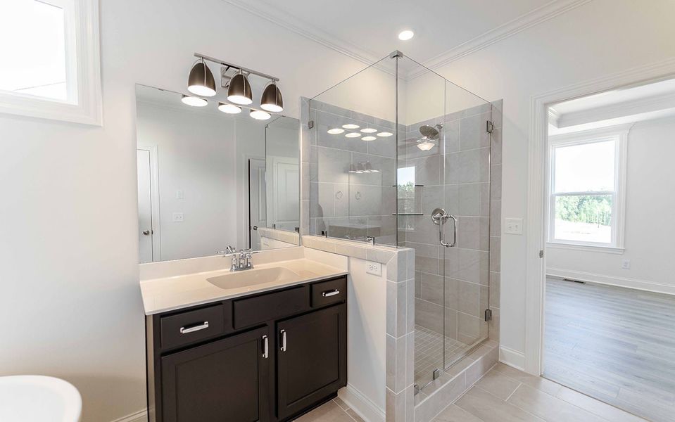 Furnished interior view inside a new home in Aden Woods, Fairview (Image 12).