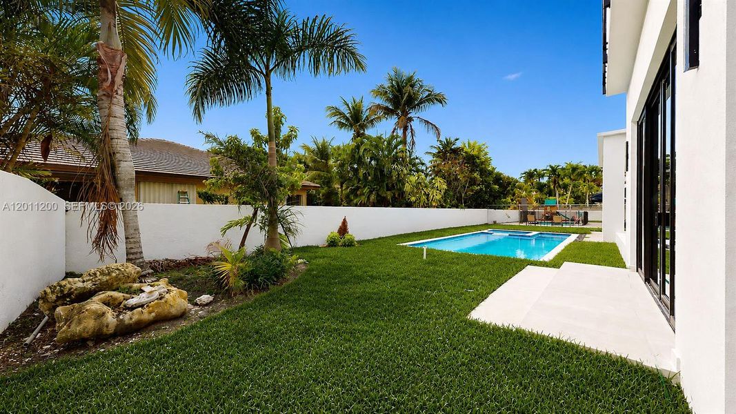 Exterior details and patio area of a home in , Miami Lakes (Image 37).