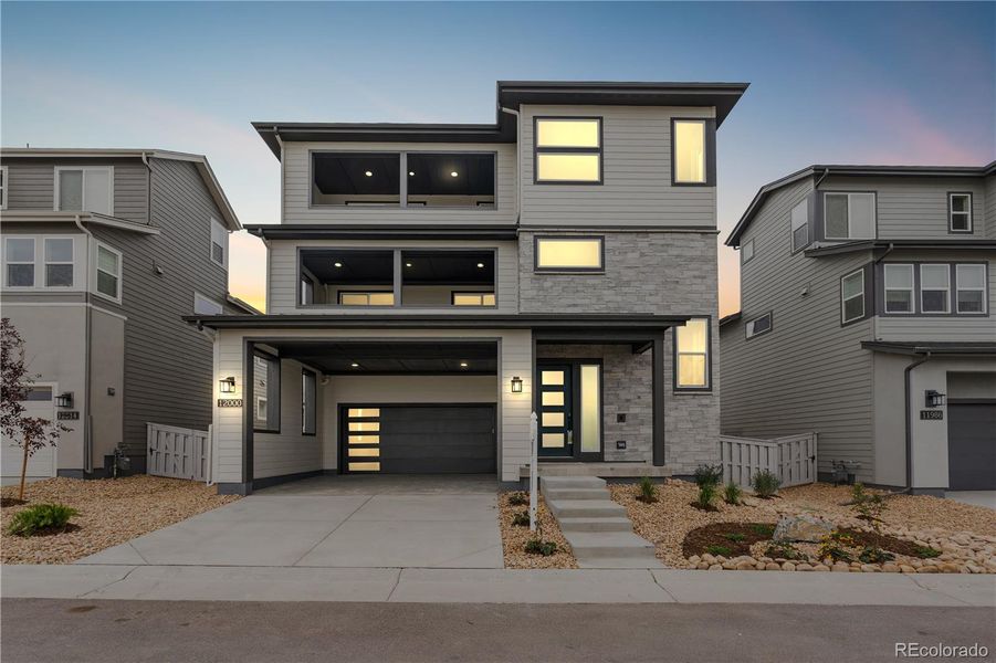 Exterior details and patio area of a home in Tribute at Lyric, Lone Tree (Image 1).