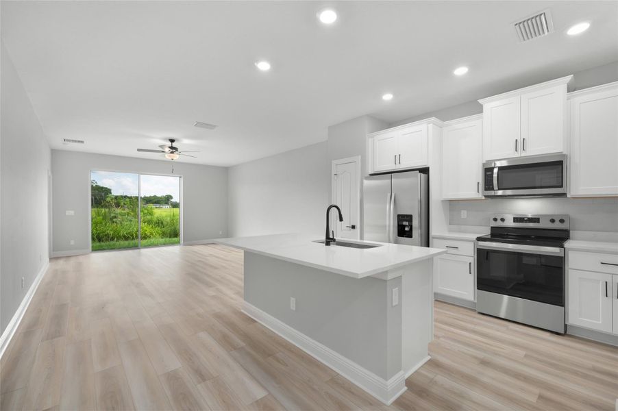 Furnished interior view inside a new home in Celebration Pointe, Fort Pierce (Image 5).