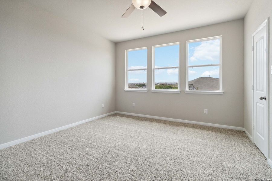Spacious, unfurnished interior of a new home in Hunters Ranch, San Antonio (Image 10).