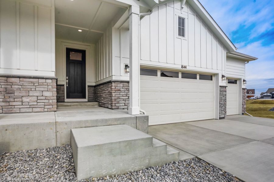 Exterior details and patio area of a home in RainDance, Windsor (Image 4).