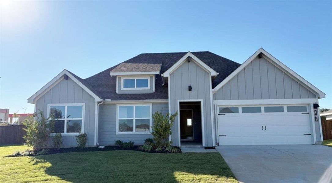 Front Elevation - D.R. Horton's Emory Floorplan - All Home and community information, including pricing, included features, terms, availability and amenities, are subject to change at any time without notice or obligation. All Drawings, pictures, photographs, video, square footages, floor plans, elevations, features, colors and sizes are approximate for illustration purposes only and will vary from the homes as built. Front Elevation - D.R. Horton's Emory Floorplan - All Home and community information, including pricing, included features, terms, availability and amenities, are subject to change at any time without notice or obligation. All Drawings, pictures, photographs, video, square footages, floor plans, elevations, features, colors and sizes are approximate for illustration purposes only and will vary from the homes as built.