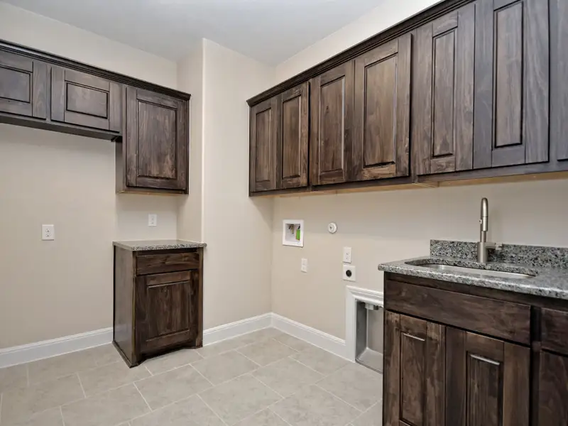 Representative furnished interior of a home built from the Santa Barbara II by Giddens Homes in Scofield Farms Estates, Georgetown (Image 16).