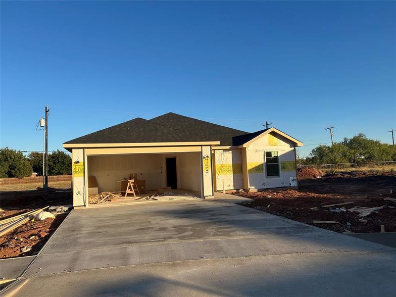 View of front of property featuring driveway