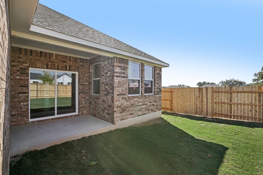 Exterior details and patio area of a home in Berry Creek Highlands, Georgetown (Image 14).