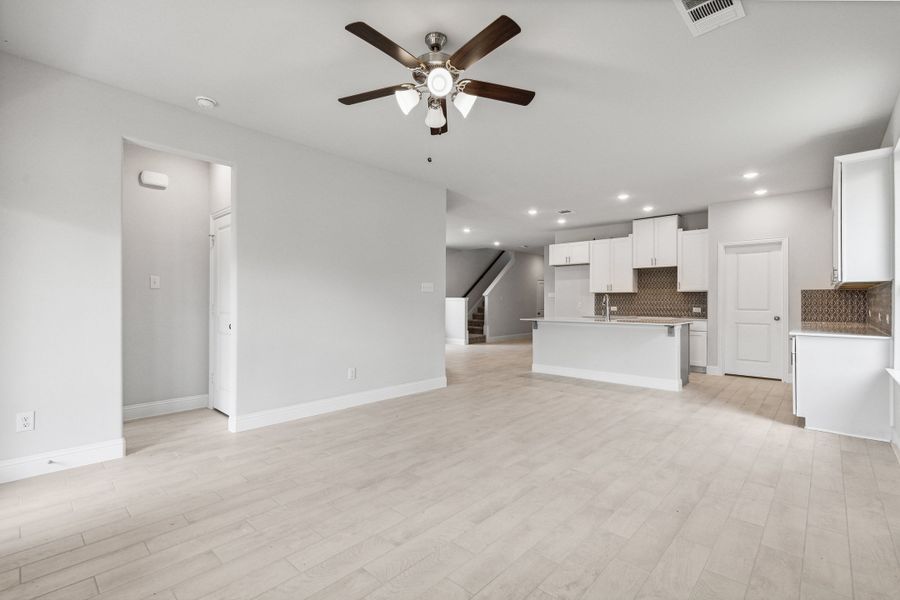 Representative unfurnished interior of a home built from the Lyla by Megatel Homes in Santorini, Seagoville (Image 8).