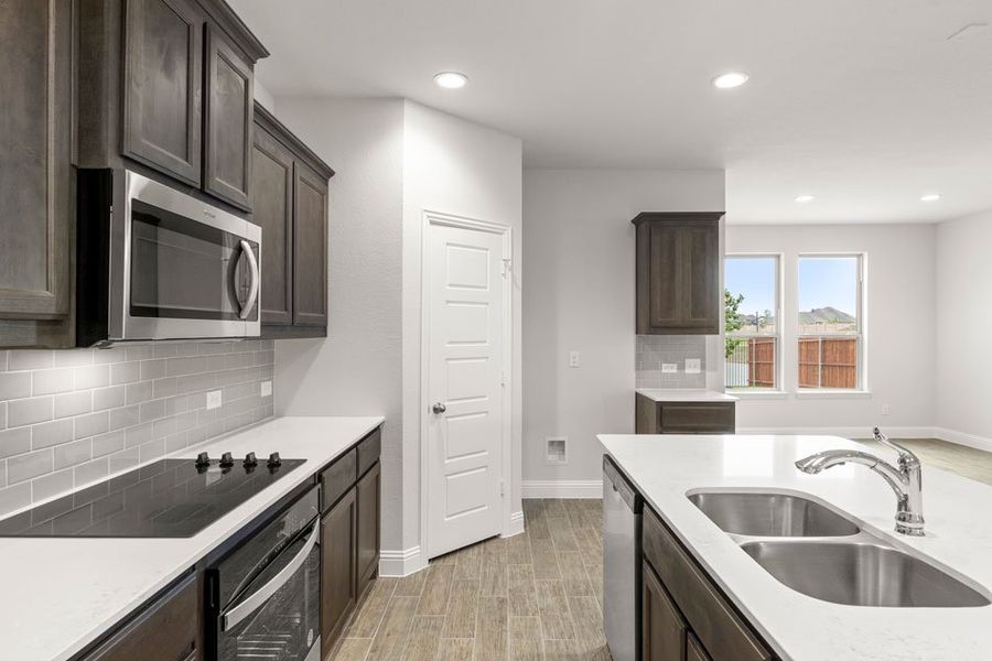 Representative exterior photo of a completed home built from the Newport by Impression Homes in Mercer Meadows, Royse City, TX (Image 8). Representative exterior photo of a completed home built from the Newport by Impression Homes in Mercer Meadows, Royse City, TX (Image 8).