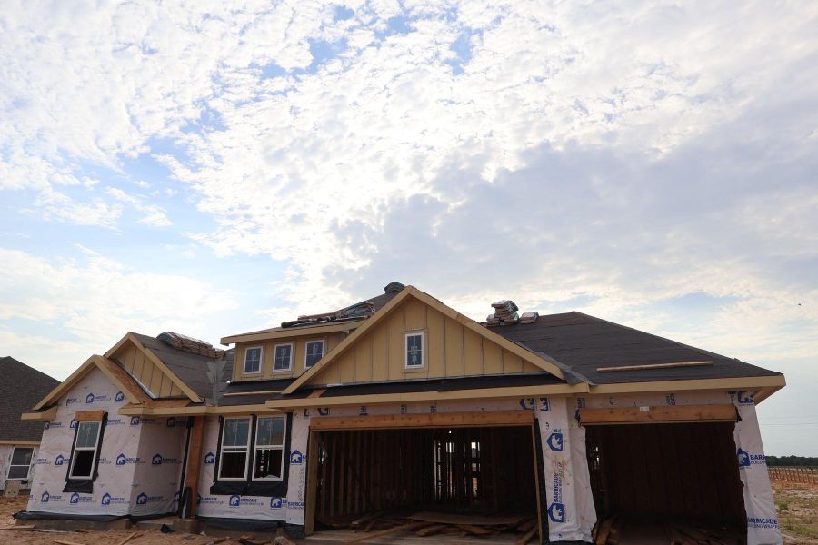 One-story home with 4 bedrooms, 3.5 baths and 4 car tandem garage