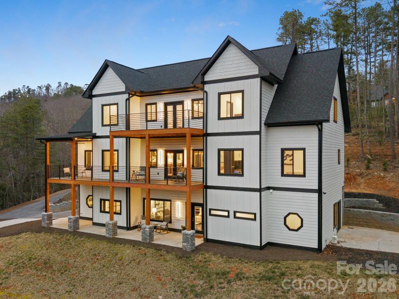 Front exterior of a new home in , Mills River, NC, highlighting curb appeal (Image 26).