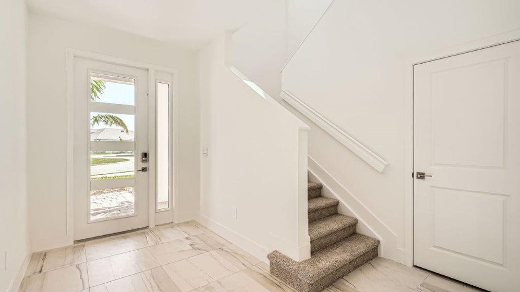 Representative unfurnished interior of a home built from the Ponte Vedra by D.R. Horton in Preserves at Park Trace, Stuart (Image 12).