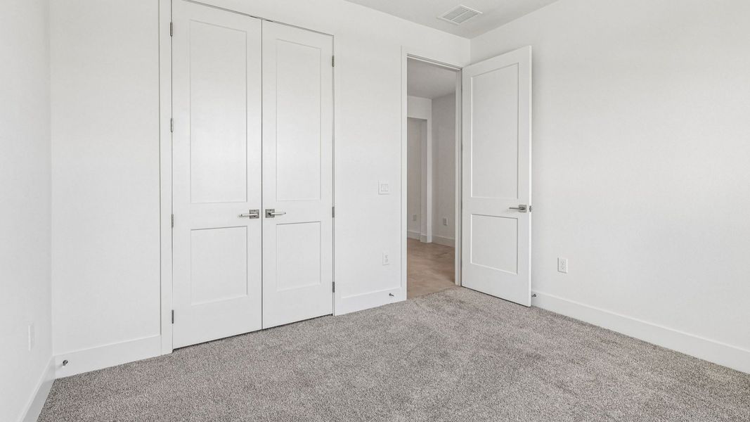Representative furnished interior of a home built from the Longleaf by DRB Homes in Ardisia Park, New Smyrna Beach (Image 15).