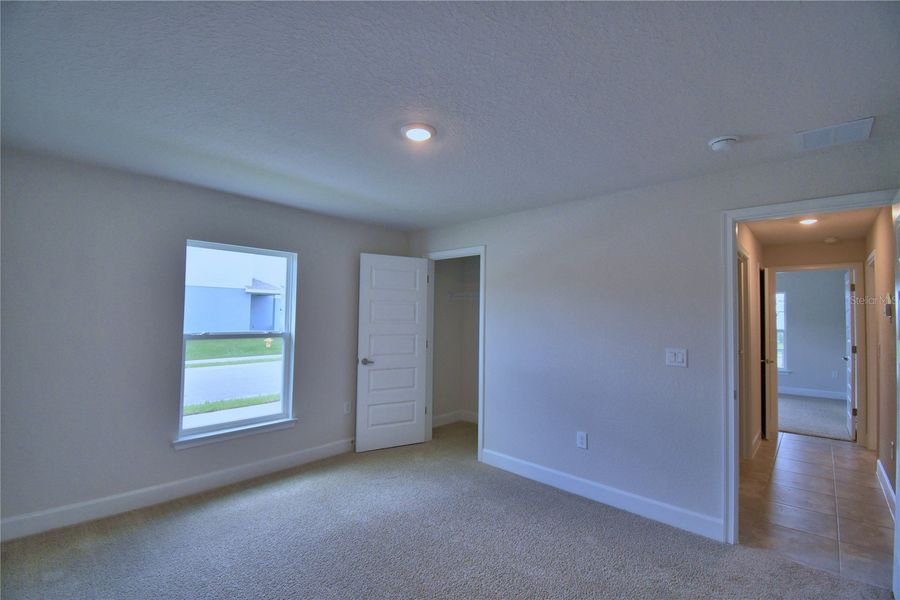 Spacious, unfurnished interior of a new home in Cadence Crossing, Auburndale (Image 24).