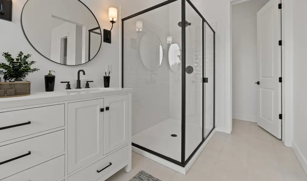 Glass shower enclosure in primary bath