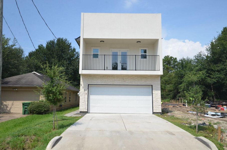 Front exterior of a new home in , Houston, TX, highlighting curb appeal (Image 24). Front exterior of a new home in , Houston, TX, highlighting curb appeal (Image 24).