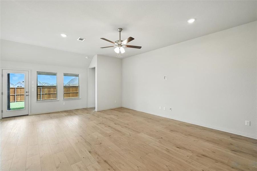 Unfurnished room featuring light wood finished floors, recessed lighting, and ceiling fan Unfurnished room featuring light wood finished floors, recessed lighting, and ceiling fan