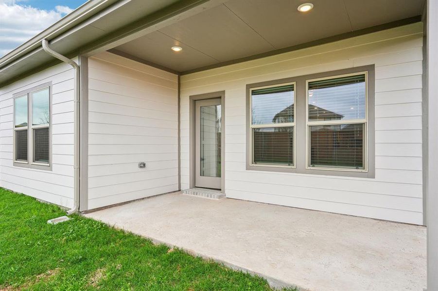 Exterior details and patio area of a home in Lakehaven - Spring Series, Farmersville (Image 24).