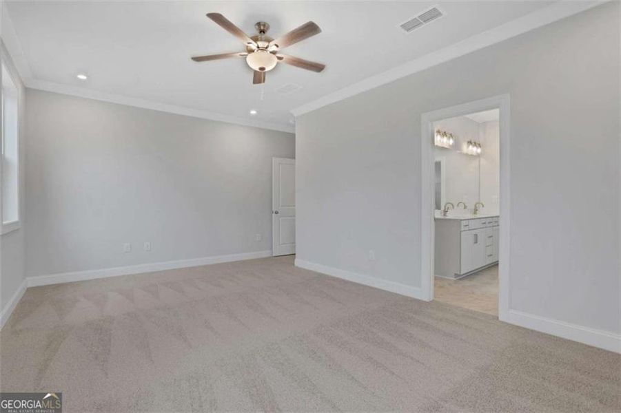 Spacious, unfurnished interior of a new home in The Paddocks at Doc Hughes, Buford (Image 42).