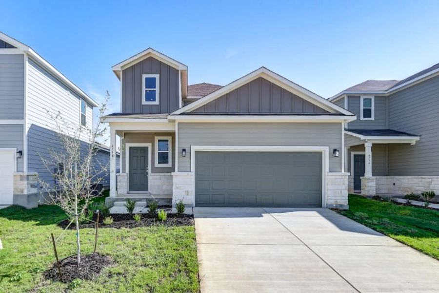Front exterior of a new home in Spring Creek, San Antonio, TX, highlighting curb appeal (Image 1). Front exterior of a new home in Spring Creek, San Antonio, TX, highlighting curb appeal (Image 1).