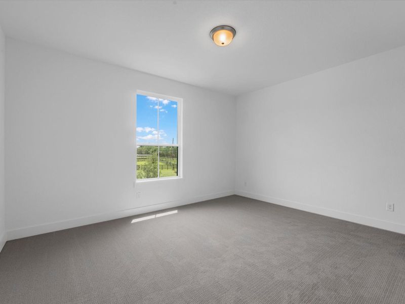 Spacious, unfurnished interior of a new home in The Estates at James Lane, Fulshear (Image 26).