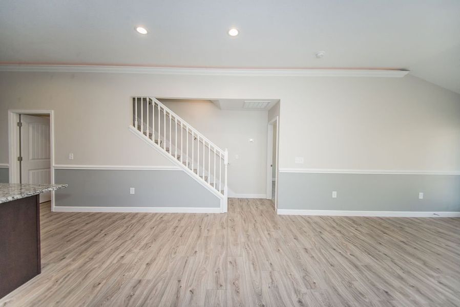 Representative unfurnished interior of a home built from the Quincy by Enchanted Homes in Lonesome Dove, San Antonio (Image 31).