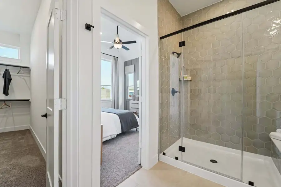 Furnished interior view inside a new home in Bridgeland, Cypress (Image 11).