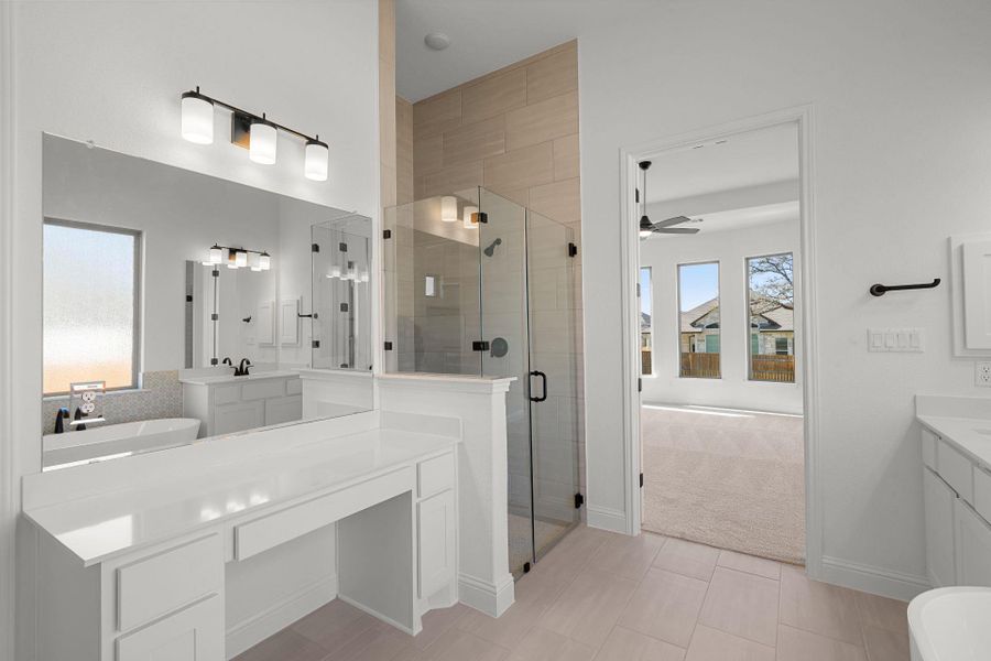Primary Bath retreat with dual vanities & walk-in shower