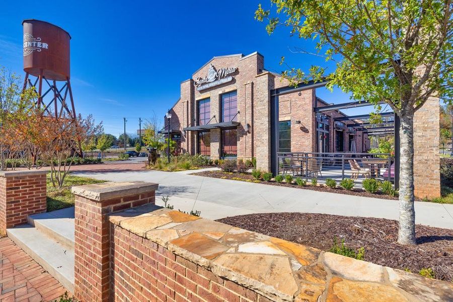 Front exterior of a new home in Arden on Lanier, Cumming, GA, highlighting curb appeal (Image 25). Front exterior of a new home in Arden on Lanier, Cumming, GA, highlighting curb appeal (Image 25).