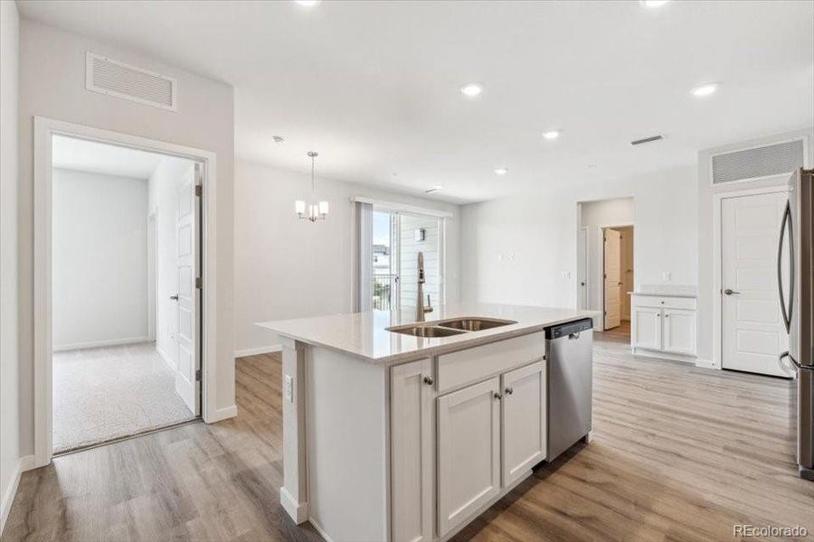 Furnished interior view inside a new home in Condo Collection at Grand Vue at Interlocken, Broomfield (Image 3).