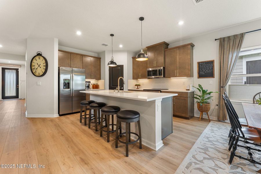 Furnished interior view inside a new home in Seminole Palms Single-Family Homes, Palm Coast (Image 49).