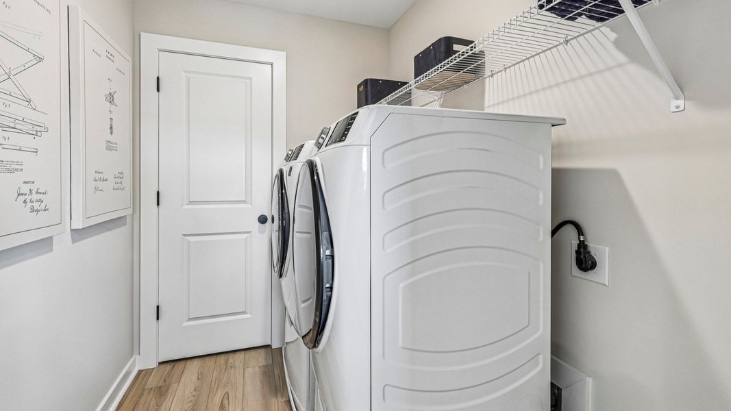 Dedicated laundry room with ventilated shelf