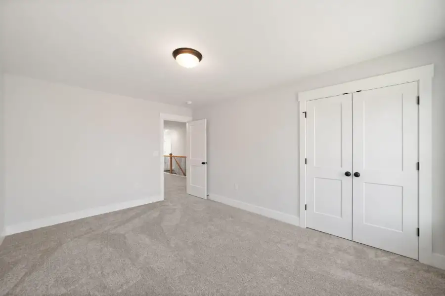 Spacious, unfurnished interior of a new home in Fiddler's Ridge, Advance (Image 21).