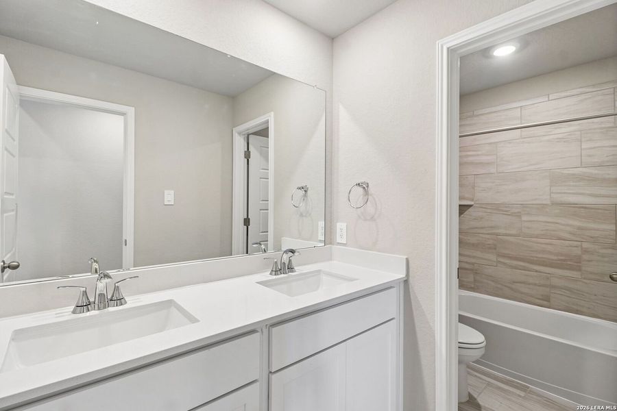 Furnished interior view inside a new home in Estancia Ranch - Premier Series, San Antonio (Image 8). Furnished interior view inside a new home in Estancia Ranch - Premier Series, San Antonio (Image 8).