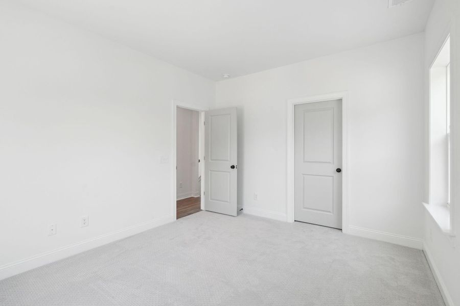 Spacious, unfurnished interior of a new home in The Domus Collection at Midtown Nexton, Summerville (Image 30).