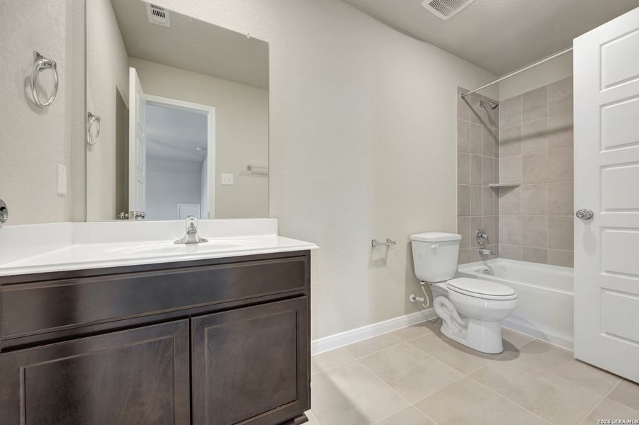 Furnished interior view inside a new home in Park Place, New Braunfels (Image 28).