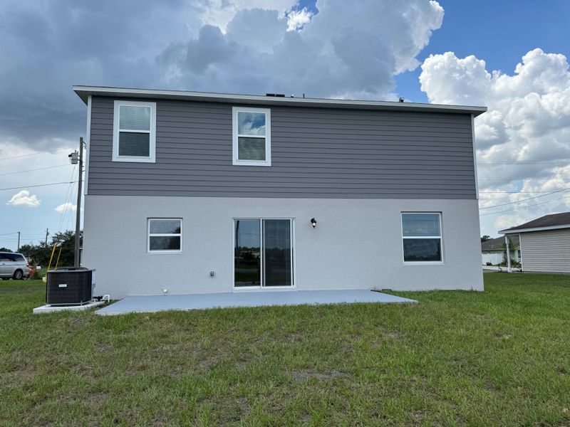Exterior details and patio area of a home in Poinciana, Poinciana (Image 3).