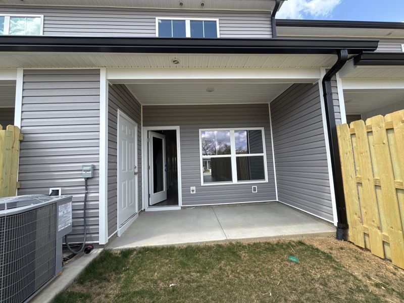 Exterior details and patio area of a home in Caroleton Townhomes, Grovetown (Image 24).