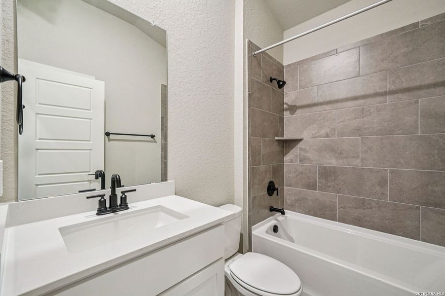 Furnished interior view inside a new home in Estancia Ranch - Classic Series, San Antonio (Image 16).