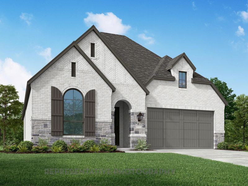 Front exterior of a new home in Riceland: 50ft. lots, Mont Belvieu, TX, highlighting curb appeal (Image 1).