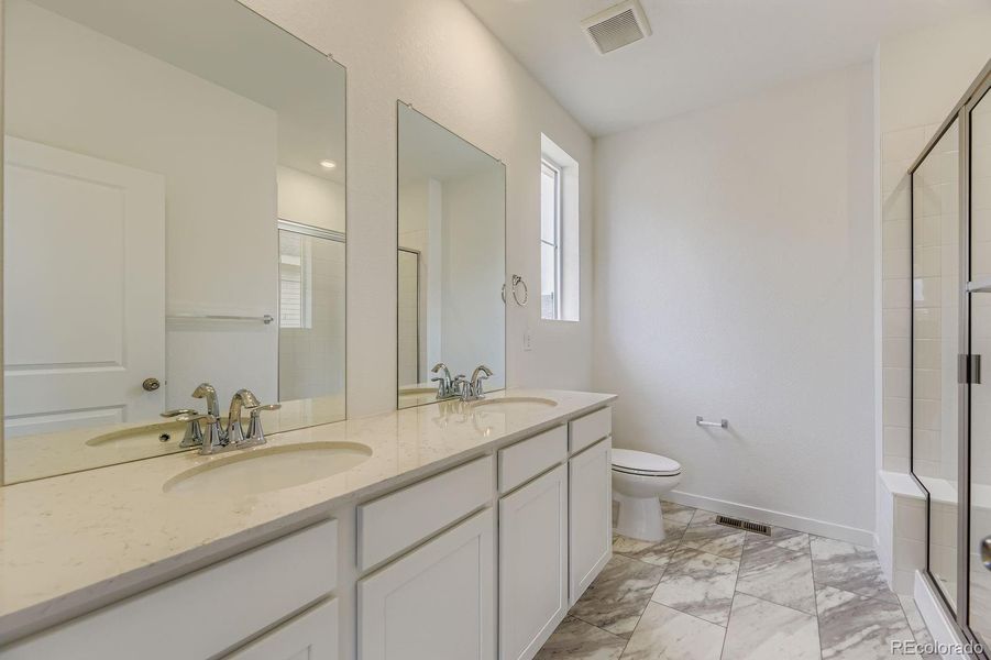 Furnished interior view inside a new home in Sky Ranch: Parkside Collection, Watkins (Image 6).