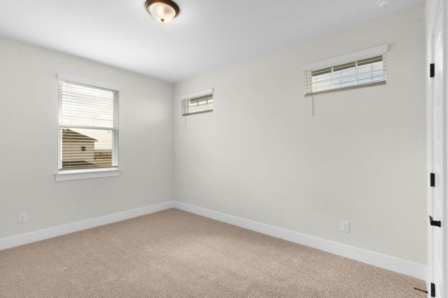 Spacious, unfurnished interior of a new home in The Grove at Blackhawk, Pflugerville (Image 20).