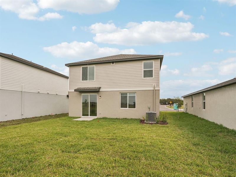 Exterior details and patio area of a home in Coasterra - Premier Series, Palmetto (Image 23).