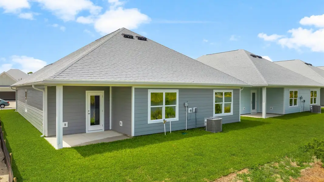 Exterior details and patio area of a home in WindMark Beach, Port Saint Joe (Image 3).