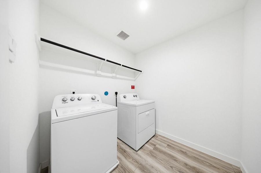 Second floor laundry room, washer and dryer included