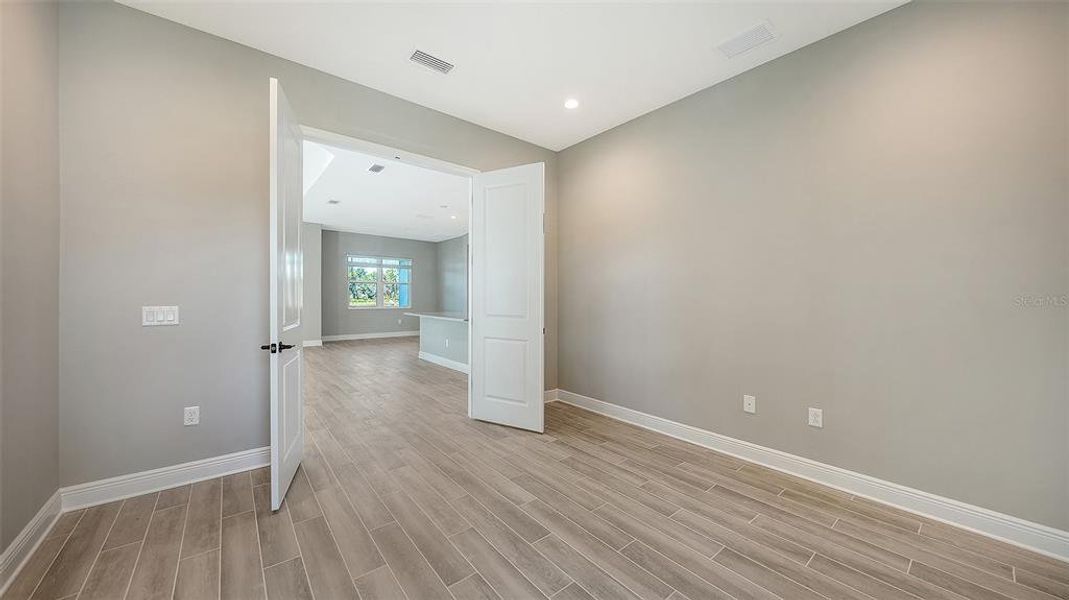 Spacious, unfurnished interior of a new home in Wildleaf, Parrish (Image 17).