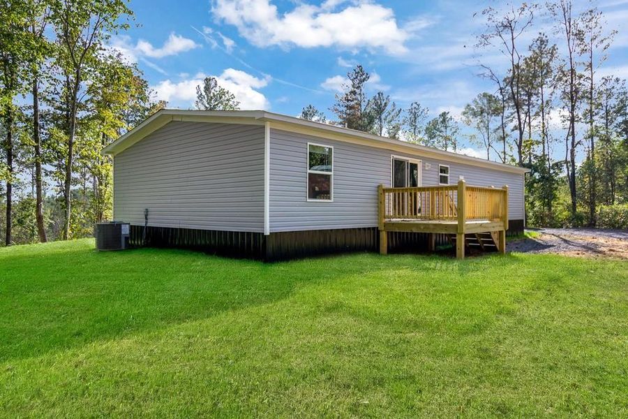 Exterior details and patio area of a home in , Ellijay (Image 2).
