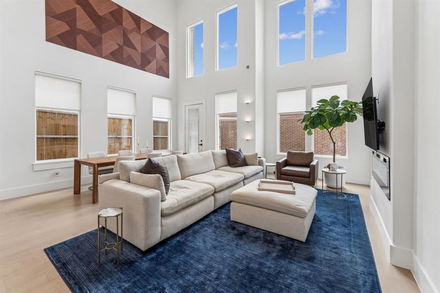 Spectacular living room with tall ceilings and walls of windows Spectacular living room with tall ceilings and walls of windows