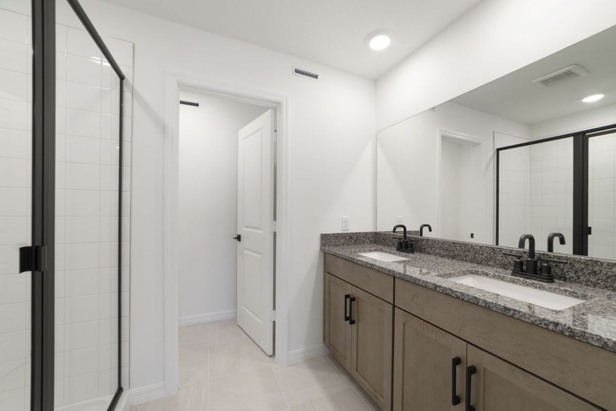 Furnished interior view inside a new home in Towns at Greenleaf, Oviedo (Image 9).