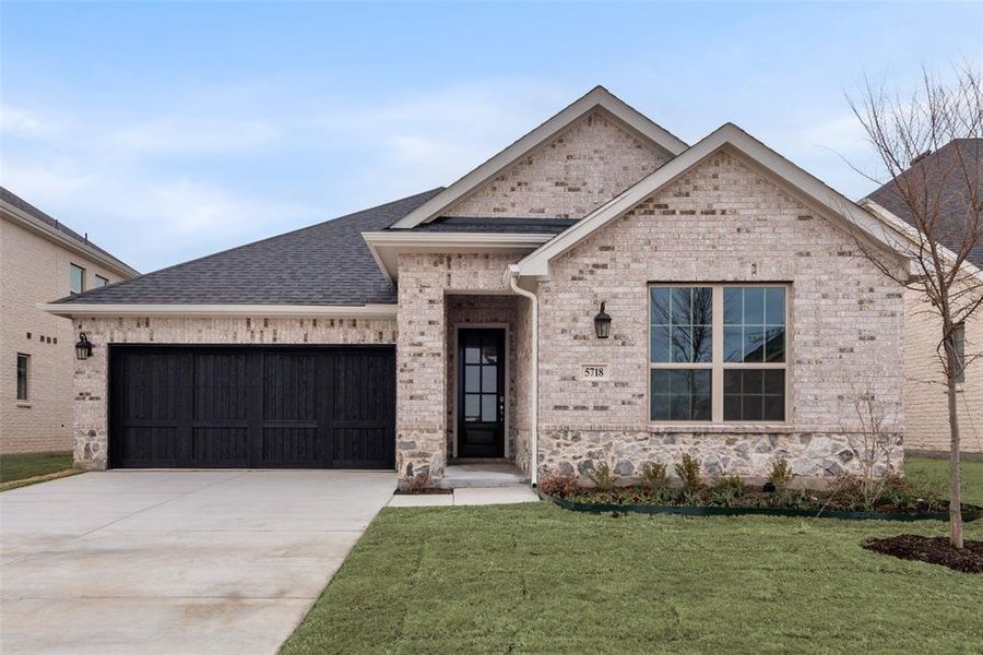 Front exterior of a new home in Sutton Fields, Celina, TX, highlighting curb appeal (Image 21).